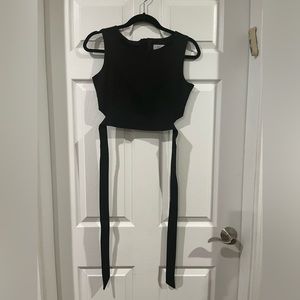 Black crop top with zipper and bowtie back by Chicwish